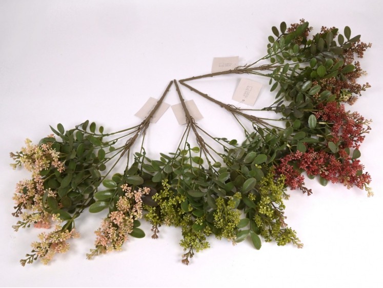 Žydintis žalumos krūmelis